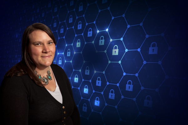 Lisa Fox with hexagons behind her and padlocks.
